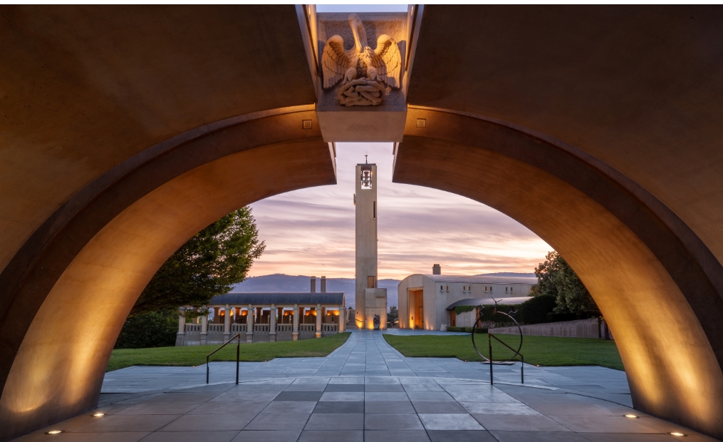 The iconic bell tower and estate courtyard at Mission Hill Family Estate Winery in West Kelowna, showcasing the award-winning architecture of one of the Okanagan Valley's most iconic wineries.