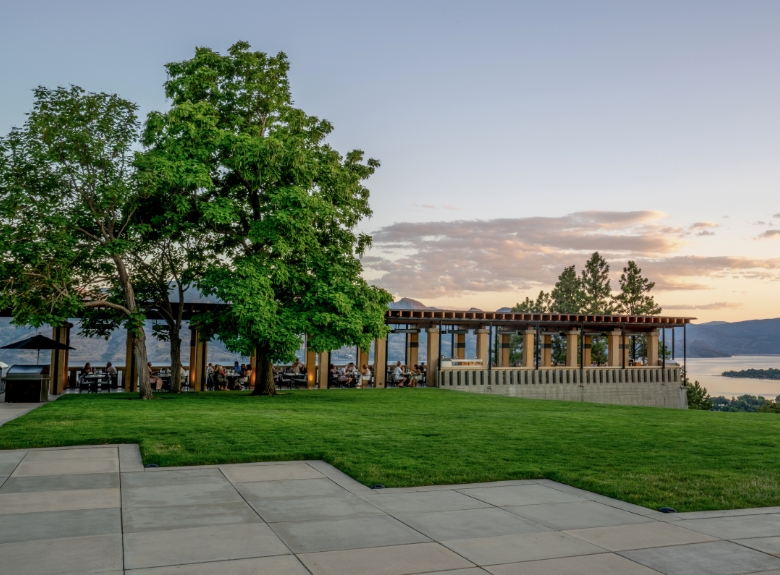 The Terrace Restaurant at Mission Hill Family Estate Winery offers outdoor dining with panoramic views of Okanagan Lake and the surrounding West Kelowna wine country.